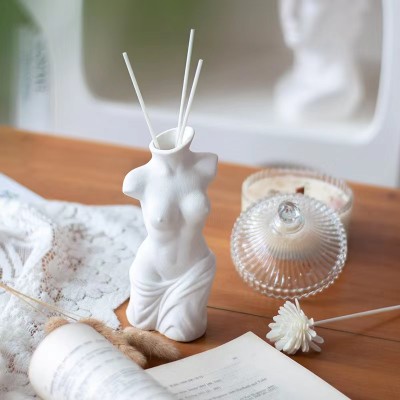 Wholesale Body Shape Sexy Ceramic White Reed Diffuser Bottles for Home Flower Vase Home Decoration Fragrance Diffusers