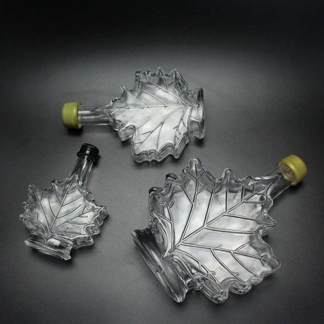 Latest Leaf Shape Engraving Liquor Bottle Long Neck Rum Vodka Whiskey Glass Bottle